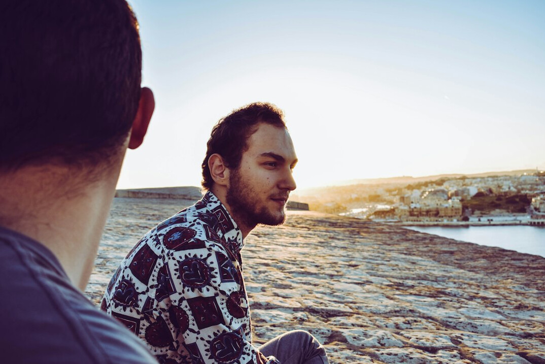 man listening actively in conversation