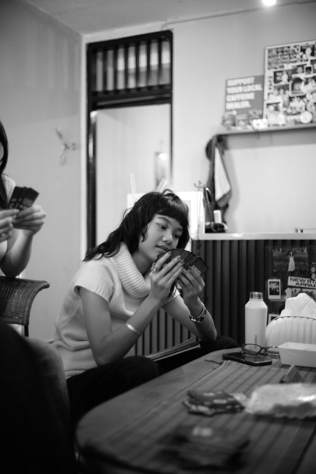 Friends talking and laughing together at a table